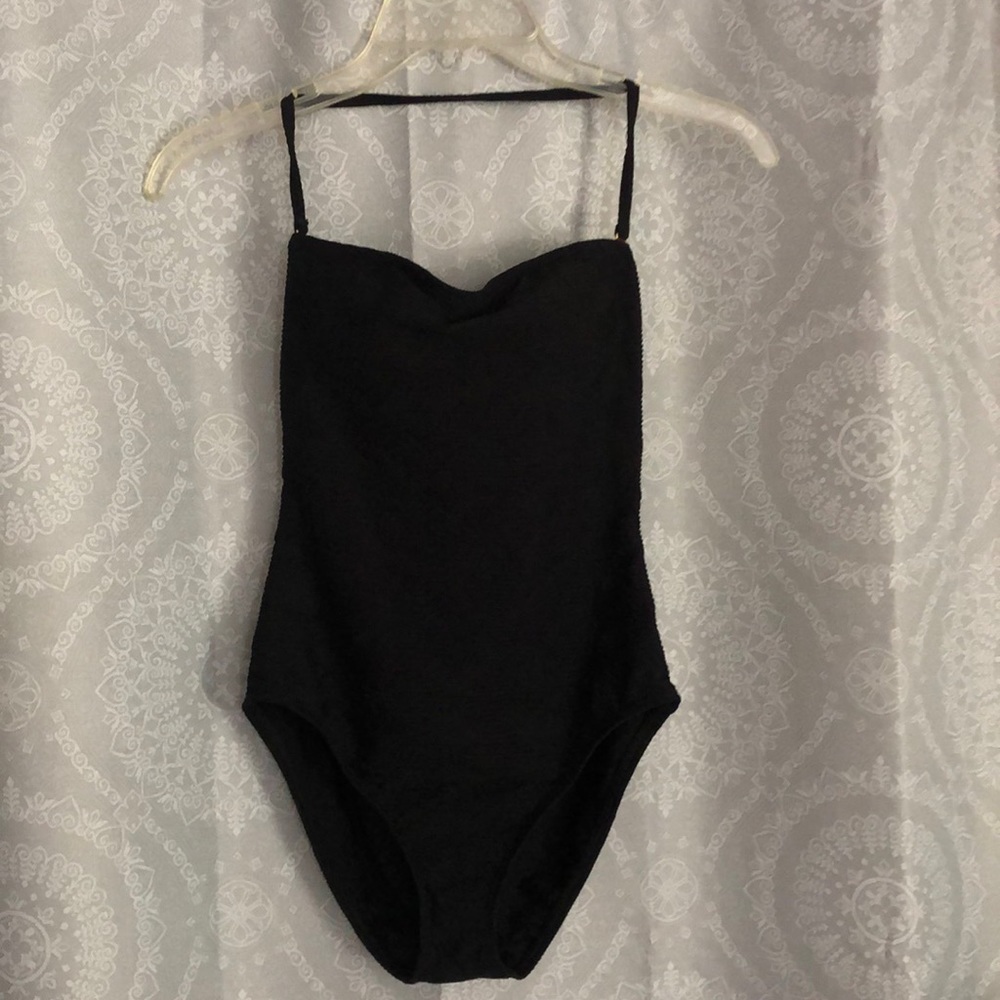 Black Anne Klein one-piece bathing suit. Never worn. Can be strapless. Size 8